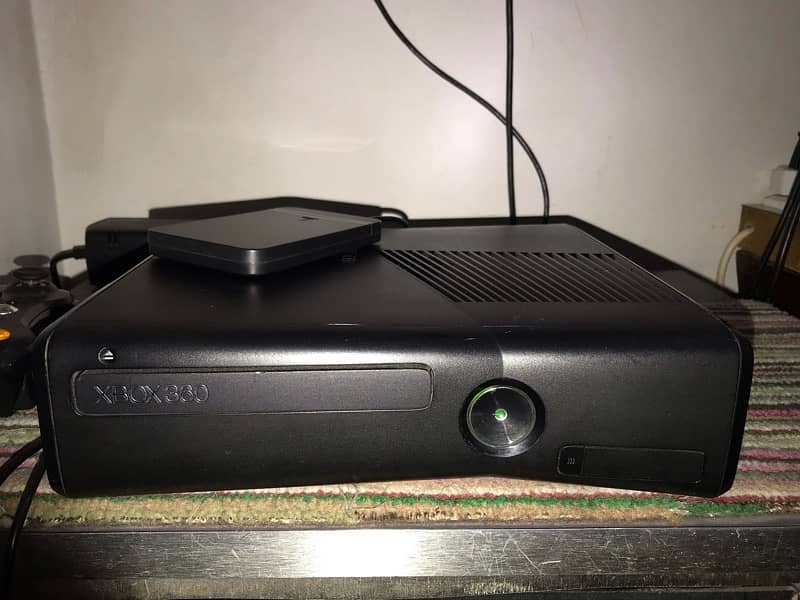 Xbox 360 Slim 0