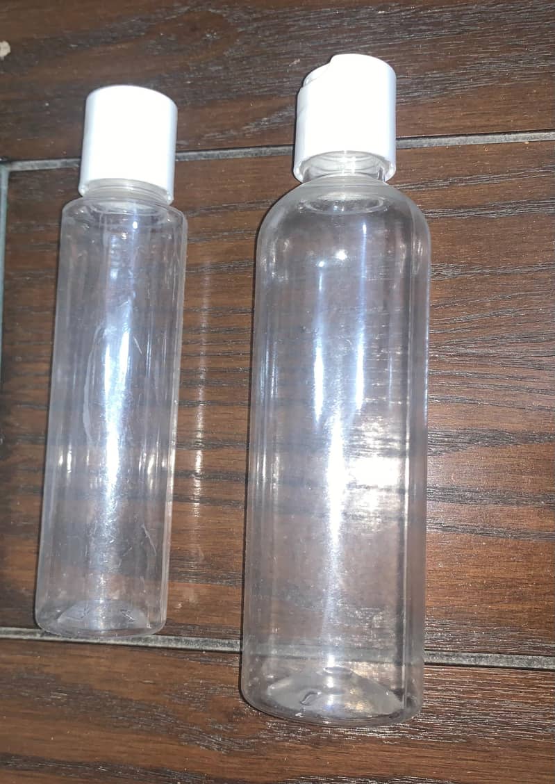 High Quality Hair Oil Bottles with caps. 100ml and 200ml (180 bottles) 1