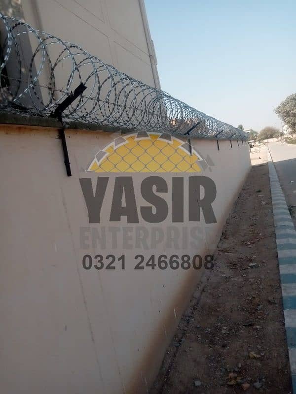 Chain link boundary wall fabrication - Razor & barbed wire - Security 12