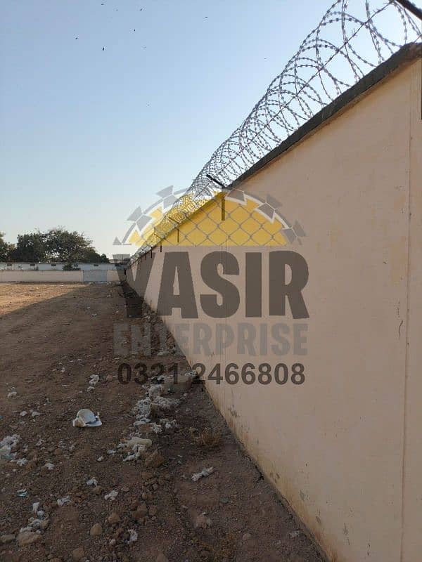 Chain link boundary wall fabrication - Razor & barbed wire - Security 15