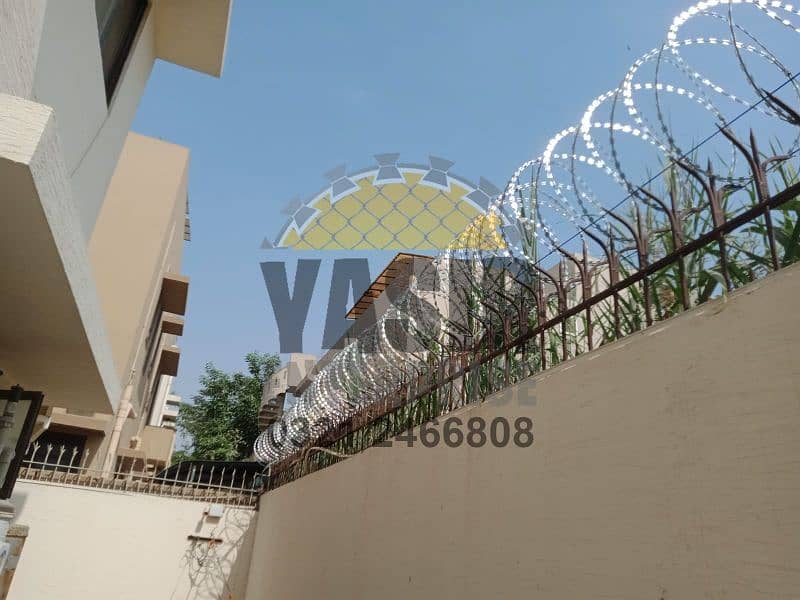 Chain link boundary wall fabrication - Razor & barbed wire - Security 17