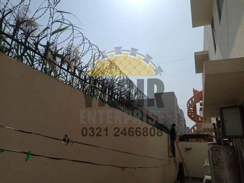 Chain link boundary wall fabrication - Razor & barbed wire - Security 18