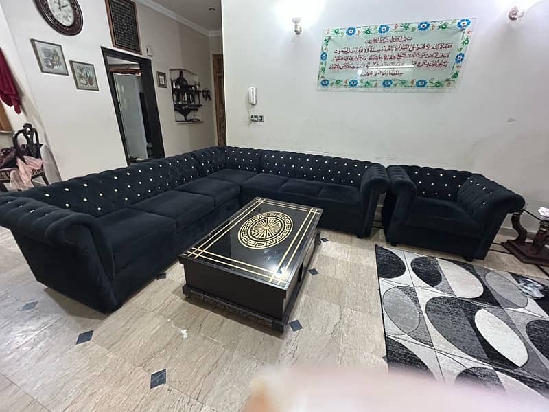 L shaped Black sofa - 8/7 seater 8