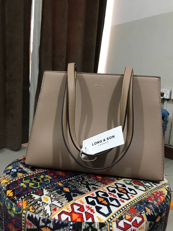 tagged imported handbag long and son London 1