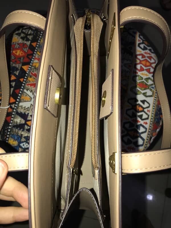 tagged imported handbag long and son London 3