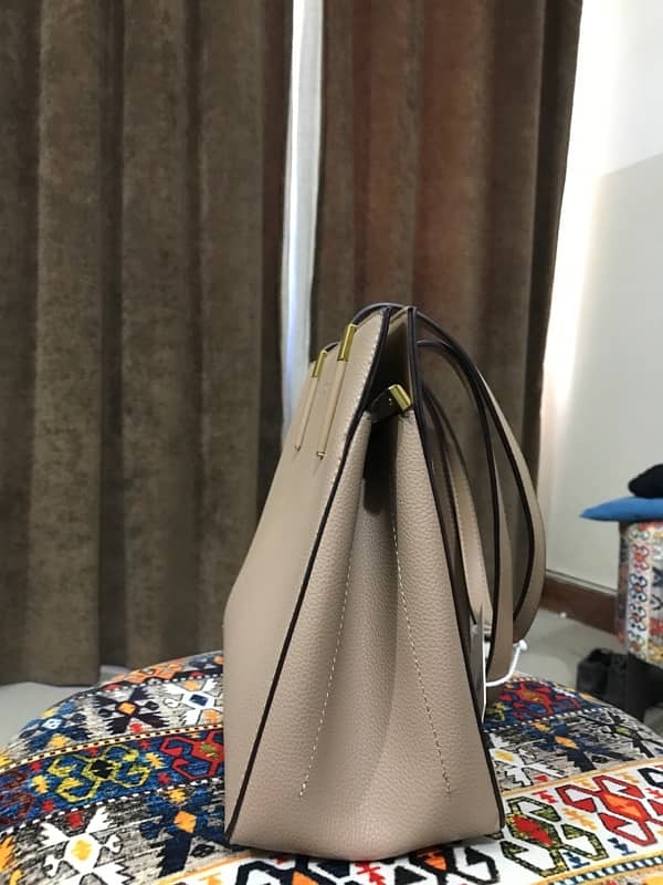 tagged imported handbag long and son London 7