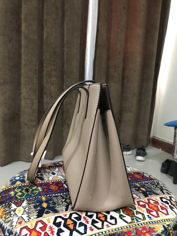 tagged imported handbag long and son London 8