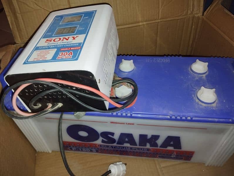 osaka battery p_180 21 plates 13 volt with charger 1