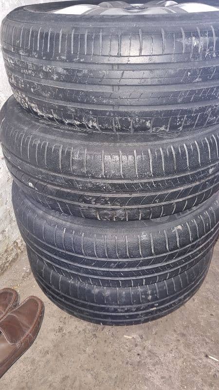 4 tires with alloys RIM for sale  185/65 R15 1