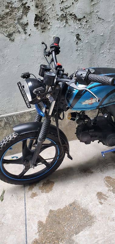 Honda 70cc fully modified everything is expensive install. 5