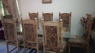 Chinoti dining table with 8 chairs urgent sale negotiable price