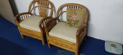 Lightly used sofa set along with a 4 seater and tables.