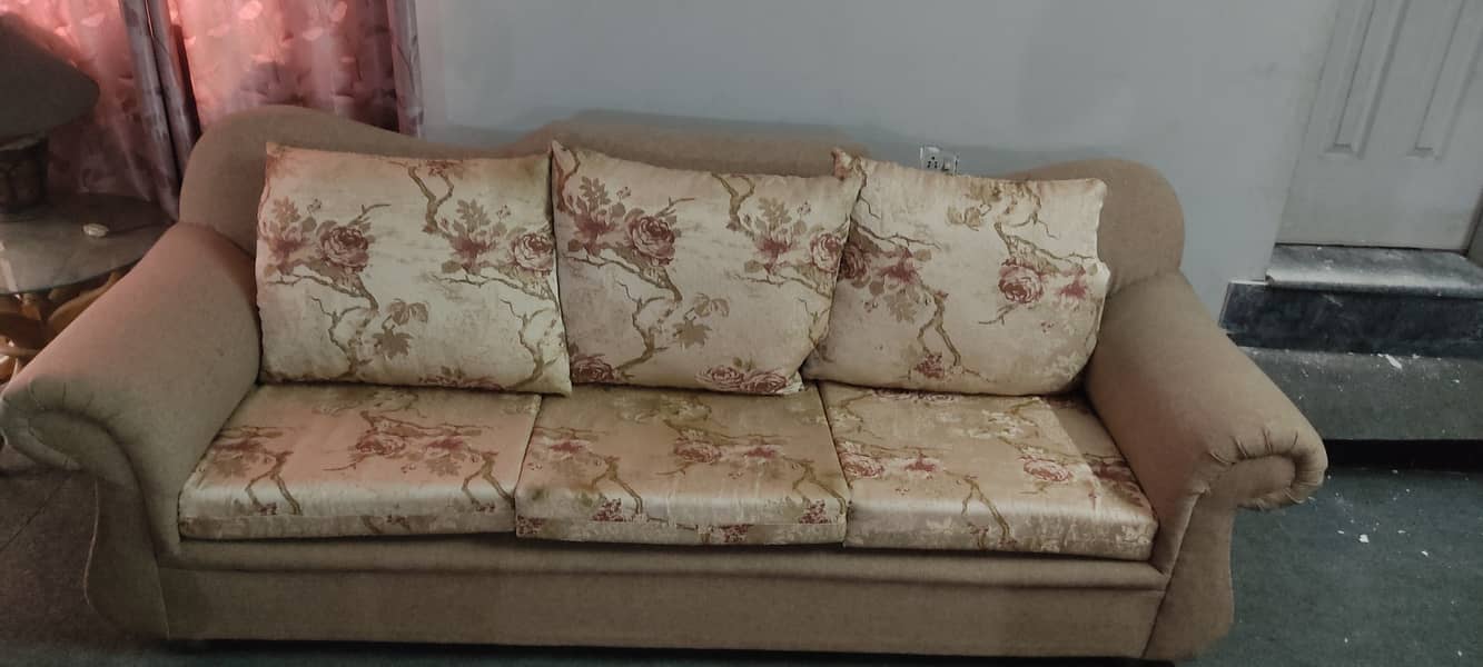 Lightly used sofa set along with a 4 seater and tables. 4