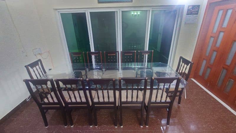 12 chairs large wooden and glass dinig tablle 4