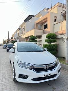 Honda City 2023 total genuine. contacting number 03152389999