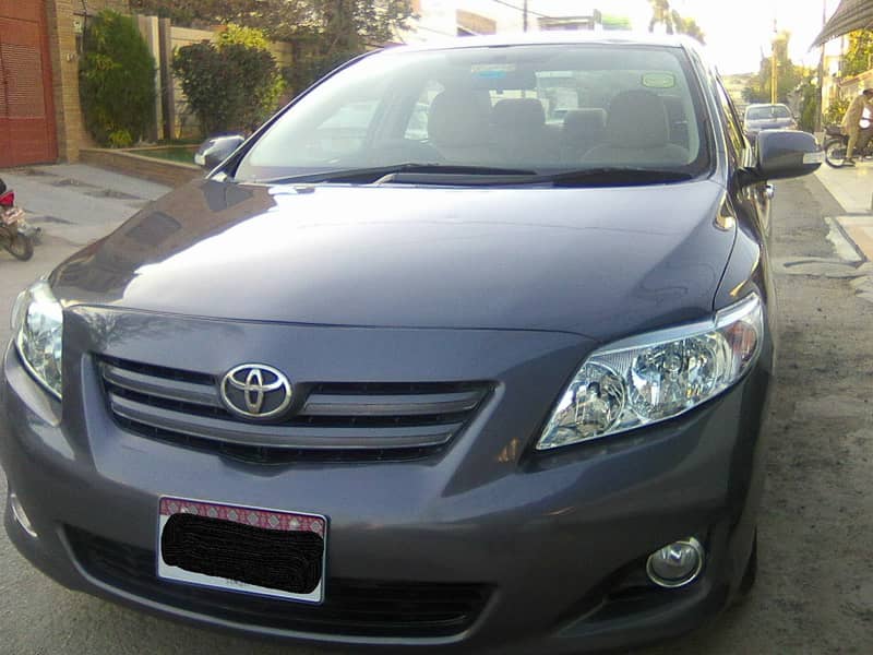 TOYOTA COROLLA GLi MODEL 2009 METALLIC GREY COLOUR BEHTREEN CONDITION 4