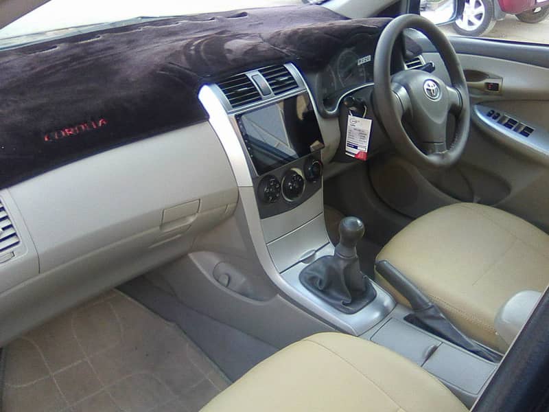 TOYOTA COROLLA GLi MODEL 2009 METALLIC GREY COLOUR BEHTREEN CONDITION 1