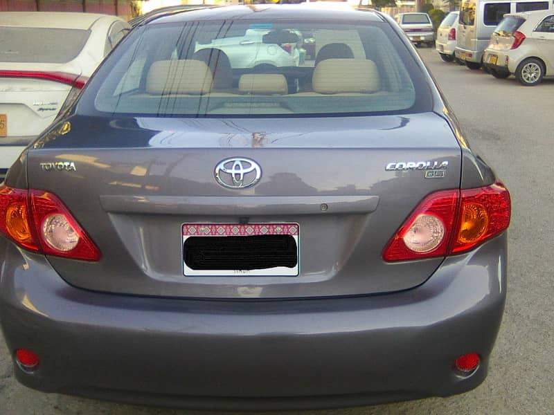 TOYOTA COROLLA GLi MODEL 2009 METALLIC GREY COLOUR BEHTREEN CONDITION 3