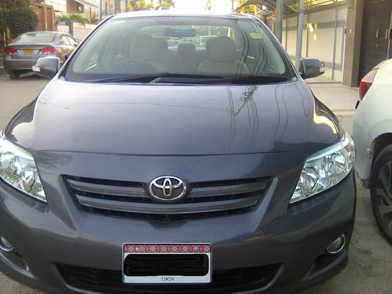 TOYOTA COROLLA GLi MODEL 2009 METALLIC GREY COLOUR BEHTREEN CONDITION 0