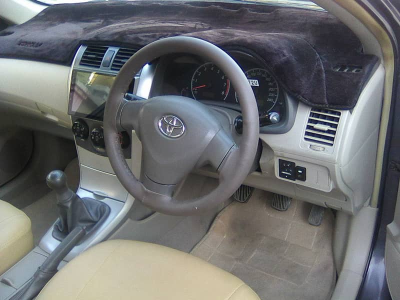 TOYOTA COROLLA GLi MODEL 2009 METALLIC GREY COLOUR BEHTREEN CONDITION 5