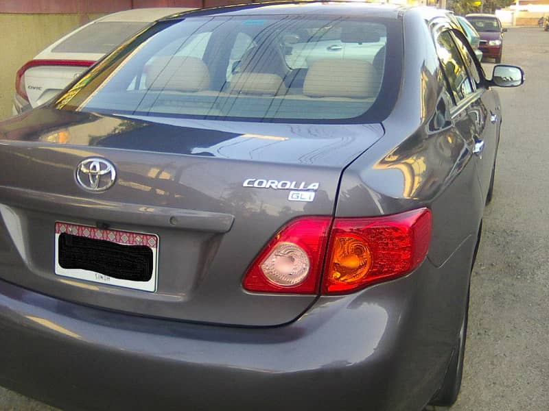 TOYOTA COROLLA GLi MODEL 2009 METALLIC GREY COLOUR BEHTREEN CONDITION 7