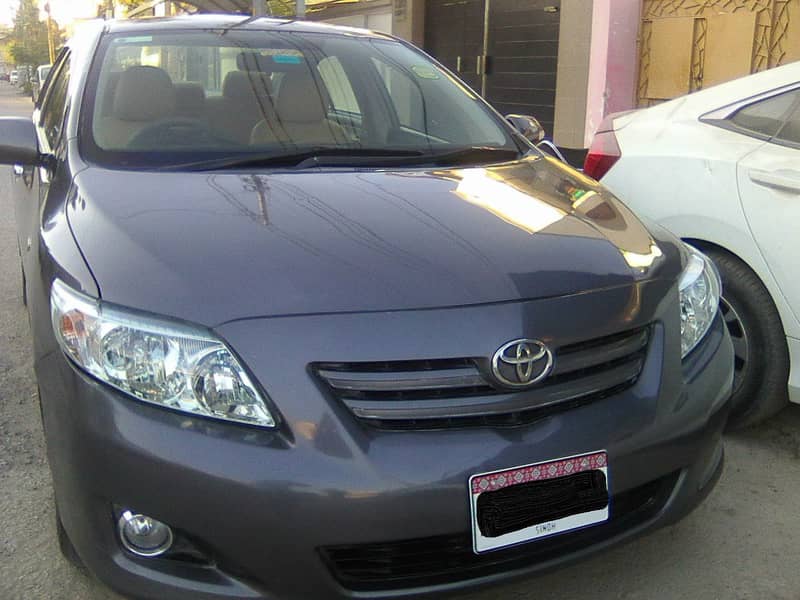 TOYOTA COROLLA GLi MODEL 2009 METALLIC GREY COLOUR BEHTREEN CONDITION 8