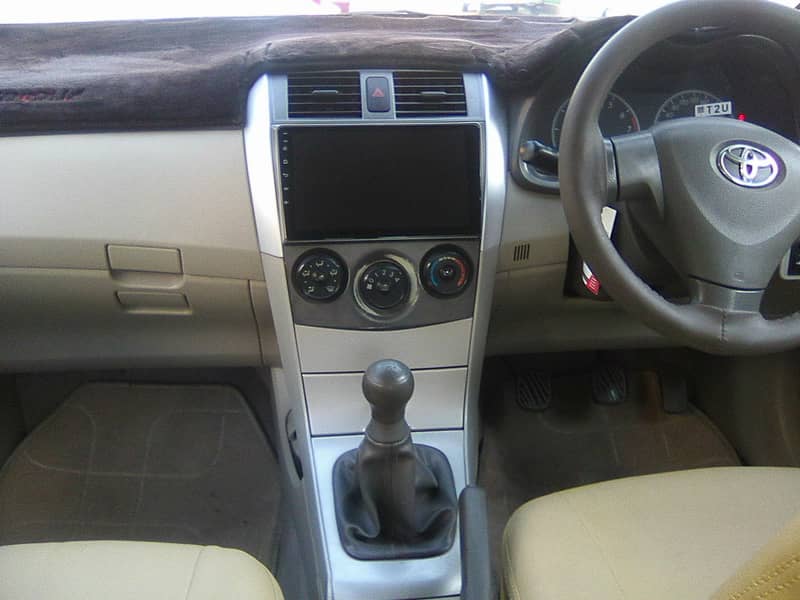 TOYOTA COROLLA GLi MODEL 2009 METALLIC GREY COLOUR BEHTREEN CONDITION 9