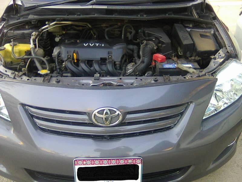 TOYOTA COROLLA GLi MODEL 2009 METALLIC GREY COLOUR BEHTREEN CONDITION 10