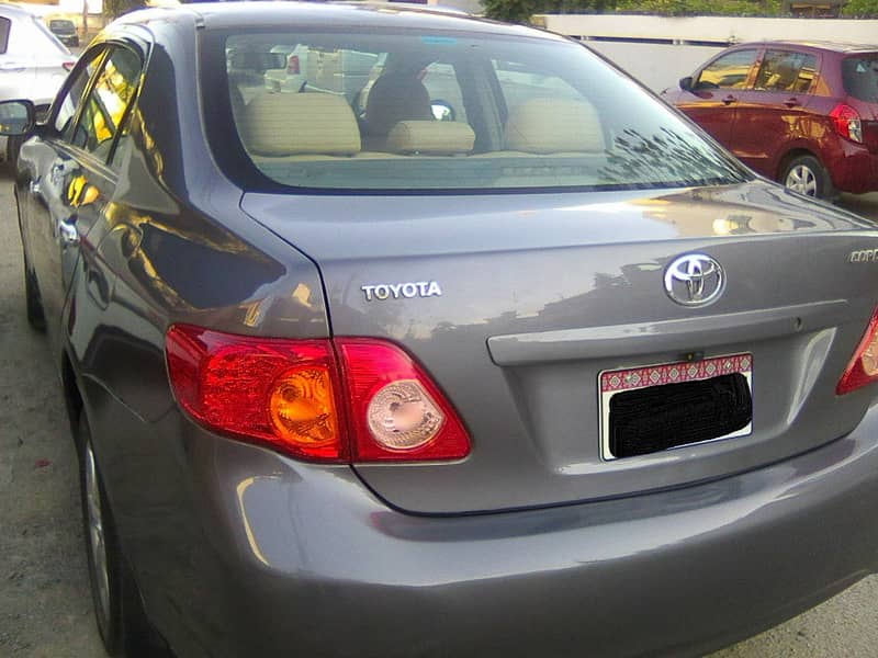 TOYOTA COROLLA GLi MODEL 2009 METALLIC GREY COLOUR BEHTREEN CONDITION 11