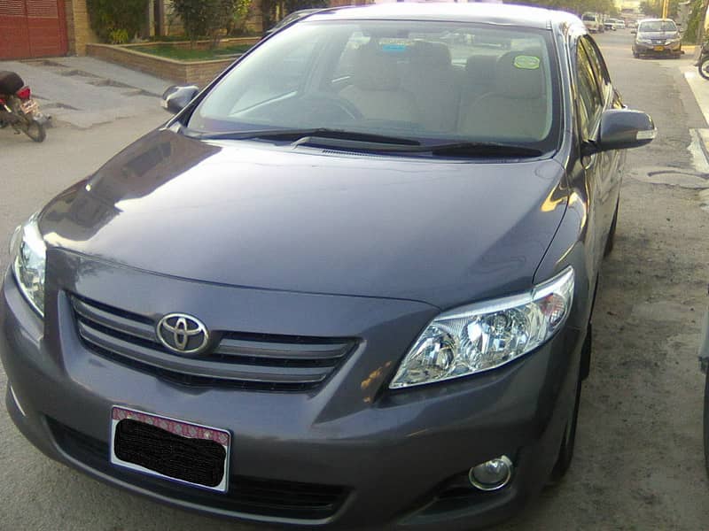 TOYOTA COROLLA GLi MODEL 2009 METALLIC GREY COLOUR BEHTREEN CONDITION 12