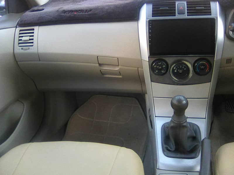 TOYOTA COROLLA GLi MODEL 2009 METALLIC GREY COLOUR BEHTREEN CONDITION 13