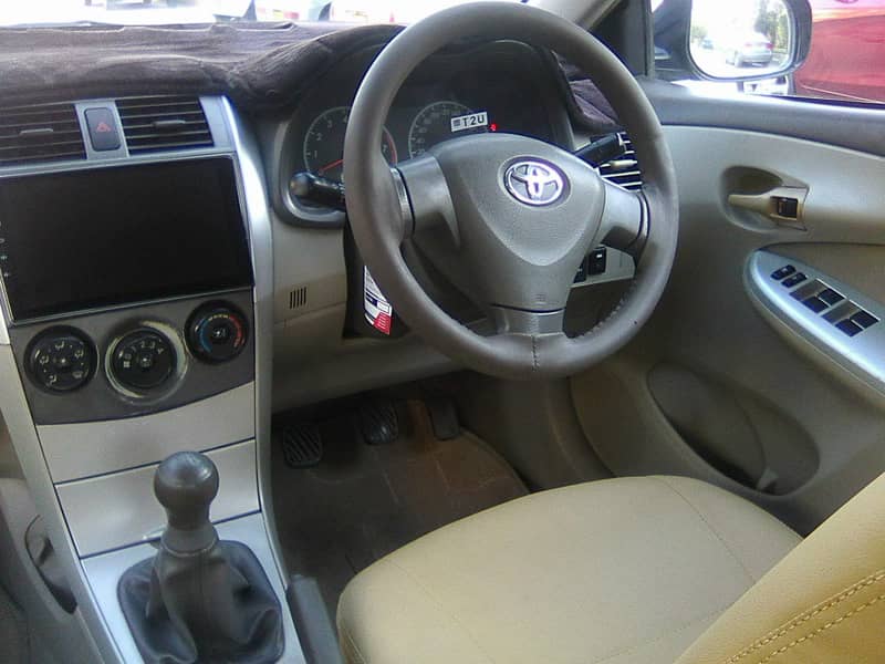 TOYOTA COROLLA GLi MODEL 2009 METALLIC GREY COLOUR BEHTREEN CONDITION 17