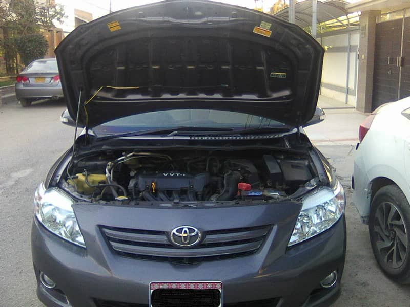 TOYOTA COROLLA GLi MODEL 2009 METALLIC GREY COLOUR BEHTREEN CONDITION 18