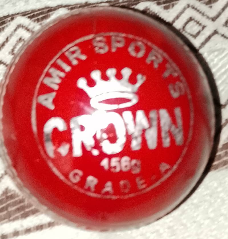 Crown Grade-A red cricket hardball phone number. 03305945112 1