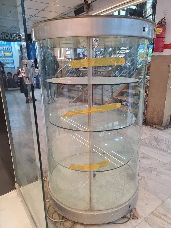 Revolving Glass Display (urgent sale) 1