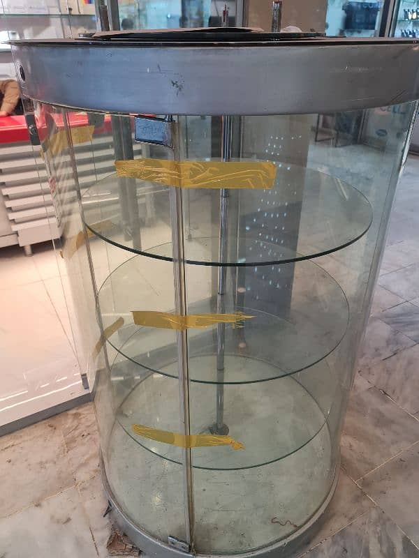 Revolving Glass Display (urgent sale) 2