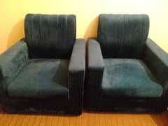 Blue velvet sofa