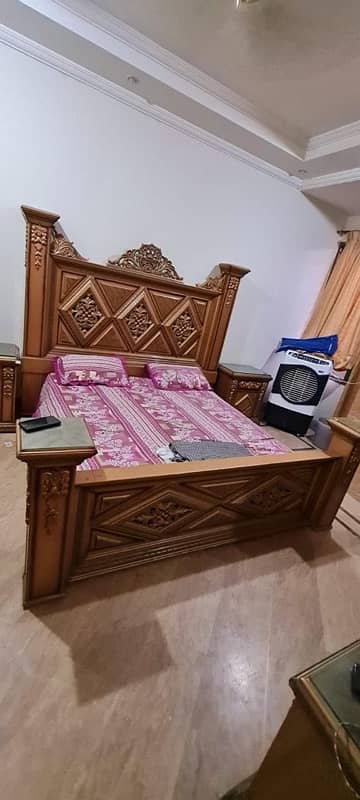 king size bed with side tables and dressing table 1