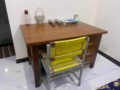 Wooden study table with chair