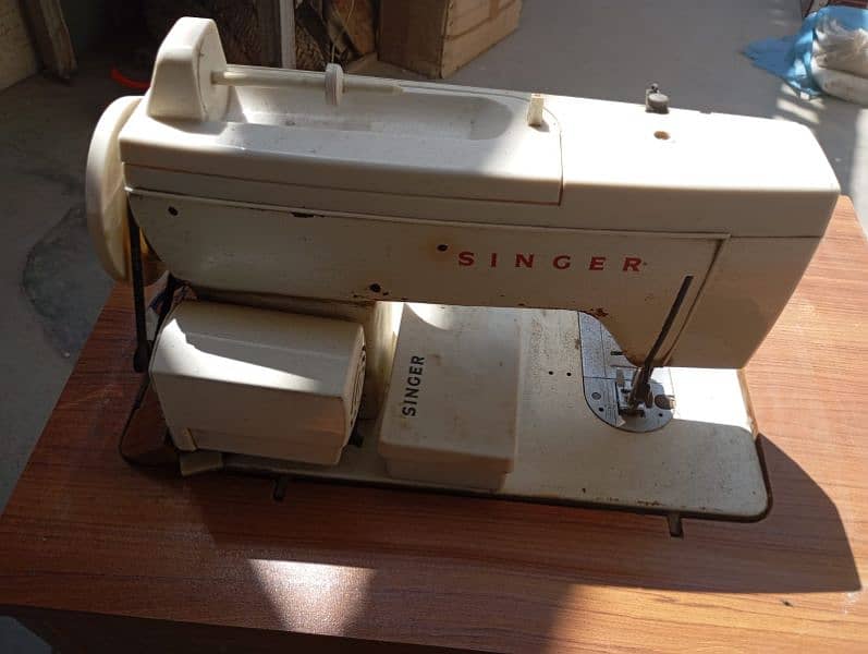 singer machine 3