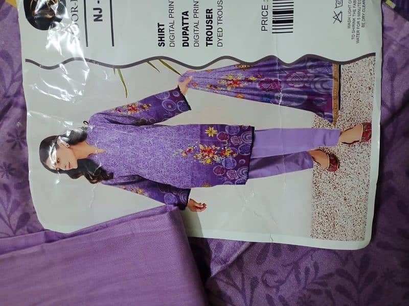 women's unstitched lawn three piece suit available for Eid UL fitr 8