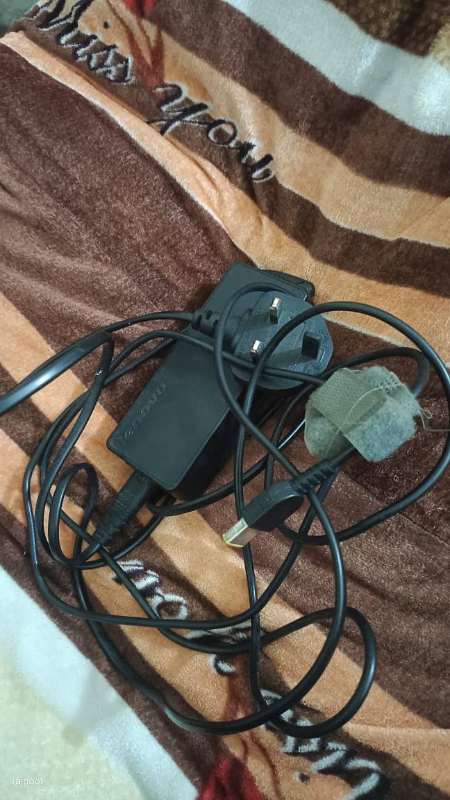 Lenovo Charger (Rs. 1350) original 2