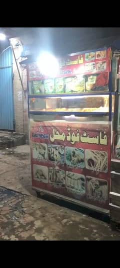 counter for sale hot plate bhi lagi Hui hai fryer bhi laga hua hai