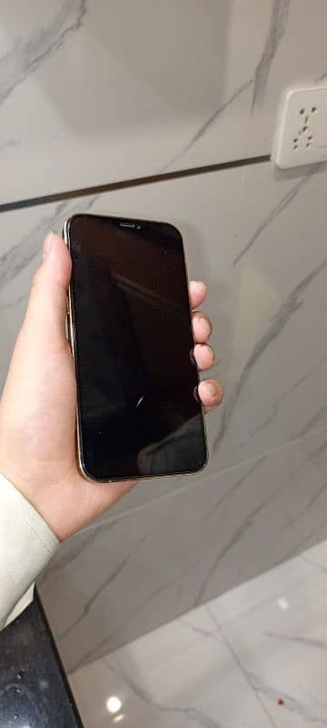 iphone 12 pro  non pta jv 77 btry 128 gb 10/9 condition 2