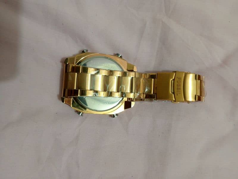 Golden Islamic watch Fossil 1