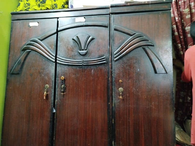 Three Door woden Almari normal condition looking good reasonable price 0