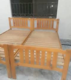 diyar wood  2 single bed with mattress.