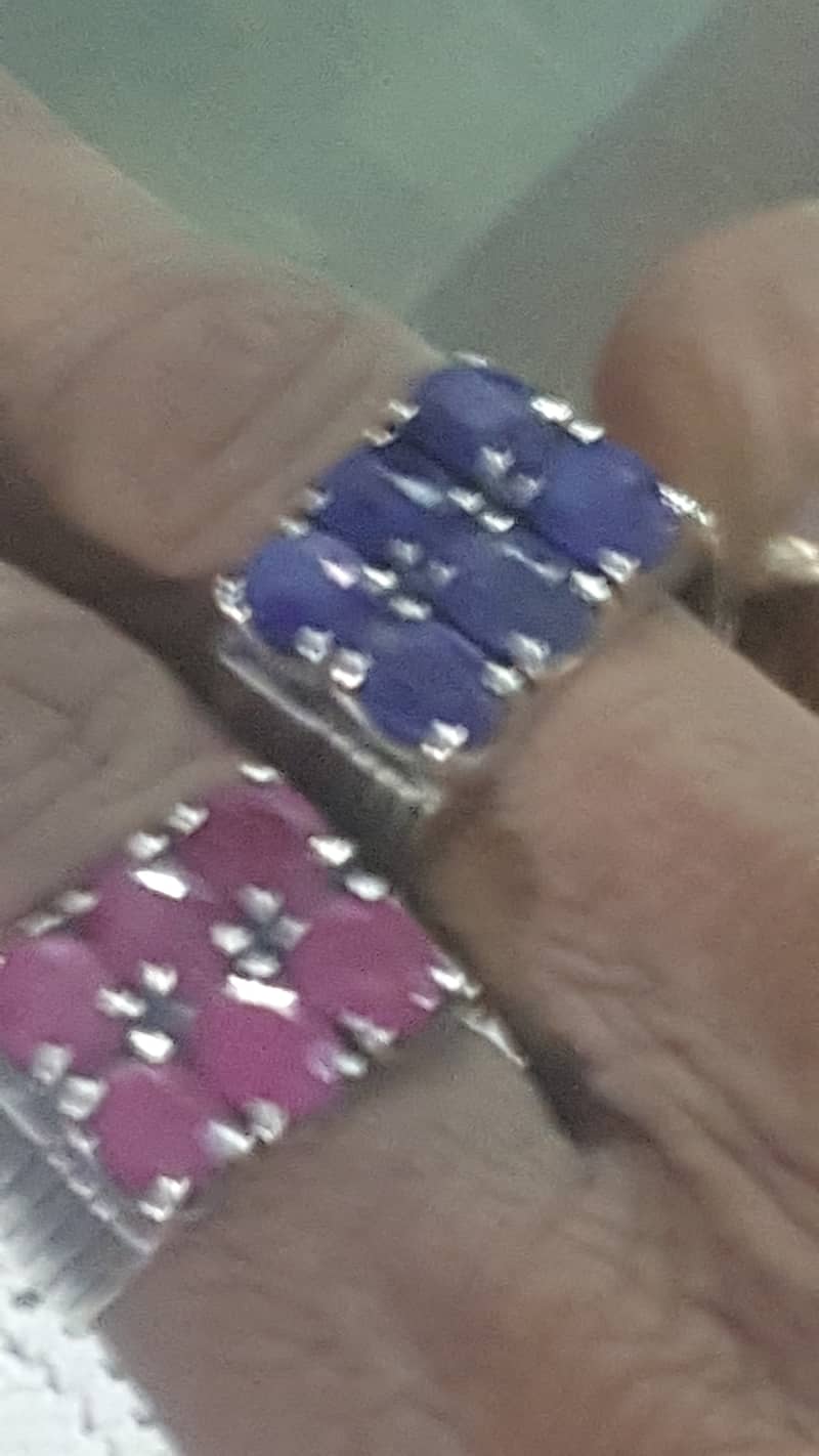 2 silver Sapphire and Ruby peair rings 0