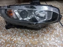 honda civic front lights in 100 % genuine condition