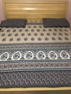 Queen bed without mattress and side tables